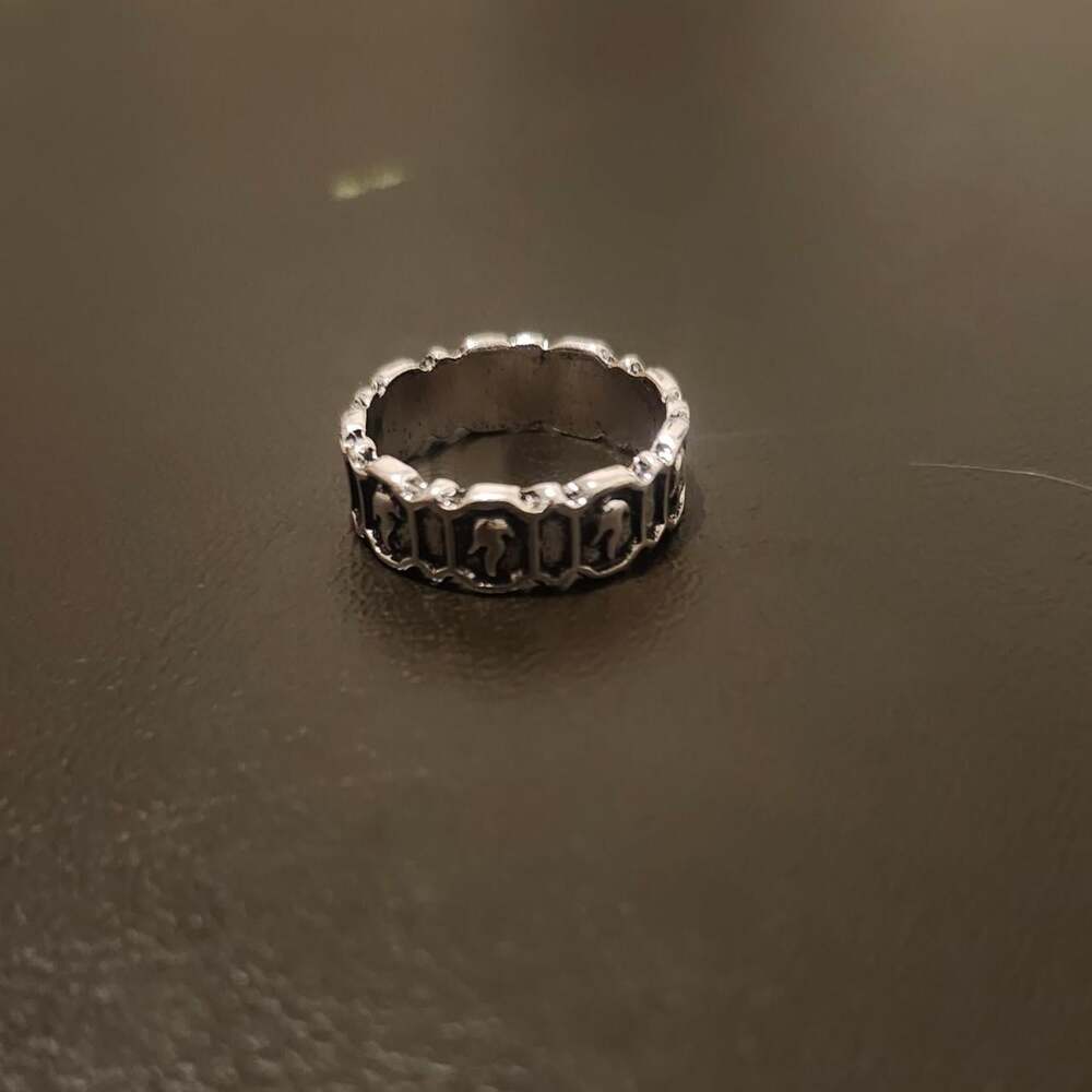 Silver Ring With Repeating Ornate Cb 94